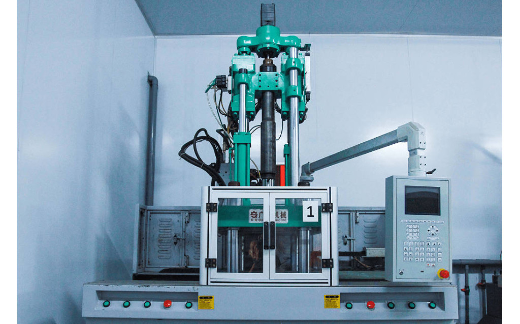 Automated high-precision Liquid Silicone Rubber (LSR) injection molding machines operating on the production floor.