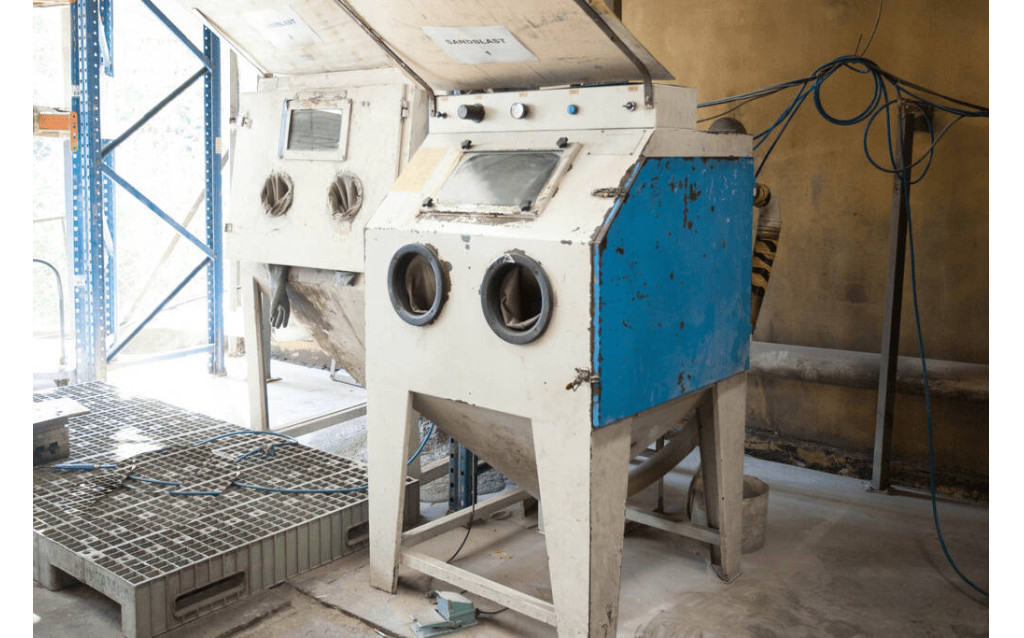 Advanced EDM wire-cut and spark erosion machinery operating inside the NK Rubber in-house tooling shop.