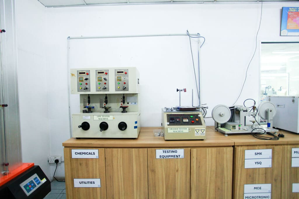 Industrial rubber manufacturing equipment and advanced machinery 13 at NK Rubber facility.